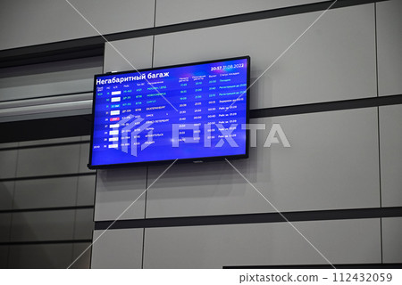 Flight schedule and check-in counter in airport 112432059