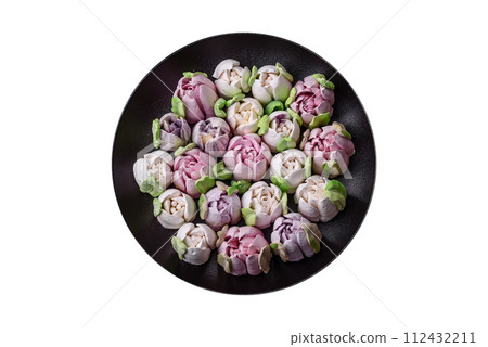 Beautiful tasty marshmallows in the form of tulip buds Beautiful tasty marshmallows in the form of tulip buds 112432211