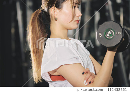 Women training at the gym Women training at the gym 112432861