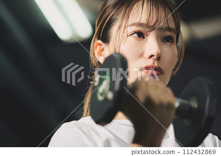 Women training at the gym Women training at the gym 112432869