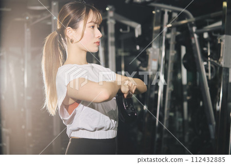 Women training at the gym Women training at the gym 112432885