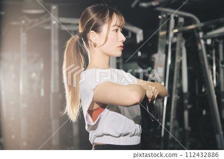Women training at the gym Women training at the gym 112432886