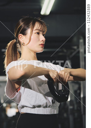 Women training at the gym Women training at the gym 112432889