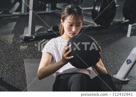 Women training at the gym Women training at the gym 112432941