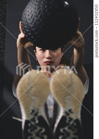 Women training at the gym Women training at the gym 112432950