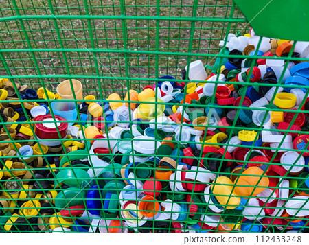 Lots of different plastic bottle caps. Garbage sorting Lots of different plastic bottle caps. Garbage sorting 112433248