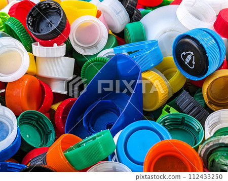 Lots of different plastic bottle caps. Garbage sorting Lots of different plastic bottle caps. Garbage sorting 112433250