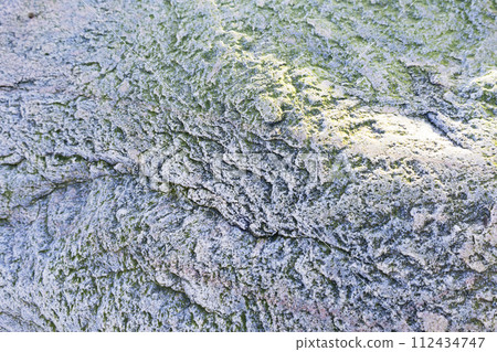 the texture of the granite stone is light gray in color, background 112434747