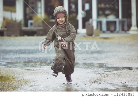 Charming child playing in Denmark 112435085
