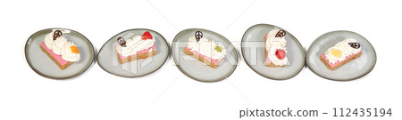 Pieces of traditional dutch oranjekoek, local delicacy from Friesland Pieces of traditional dutch oranjekoek, local delicacy from Friesland 112435194