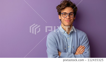 Man Standing in Front of Purple Brick Wall 112435325