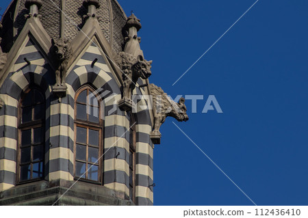 Detail of the historic Gothic Revival style Rafael Uribe Uribe Palace of Culture located at the Botero Square in Medellin declared National Monument of Colombia in 1982. 112436410