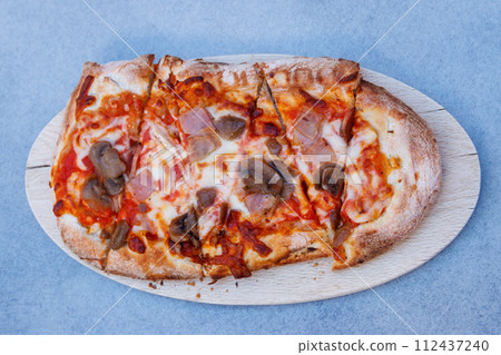 Tasty pinsa on a table. Top view 112437240