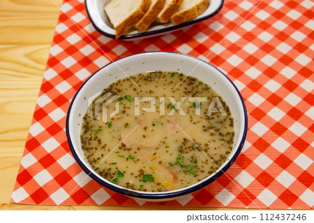 Traditional Polish soup Zurek on a table Traditional Polish soup Zurek on a table 112437246