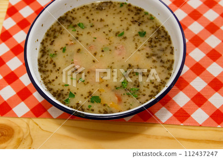 Traditional Polish soup Zurek on a table Traditional Polish soup Zurek on a table 112437247