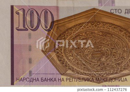 Macro shot of one hundred macedonian denar banknote Macro shot of one hundred macedonian denar banknote 112437276