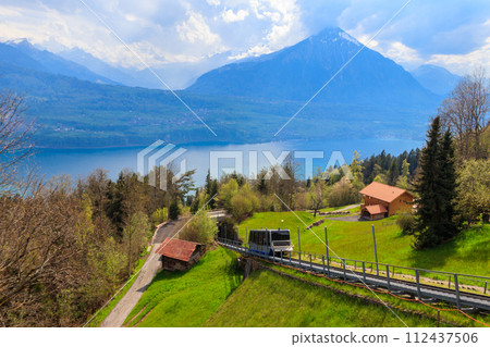 Funicular to the Niederhorn mountain with view of Lake Thun and Niesen mountain in Switzerland Funicular to the Niederhorn mountain with view of Lake Thun and Niesen mountain in Switzerland 112437506