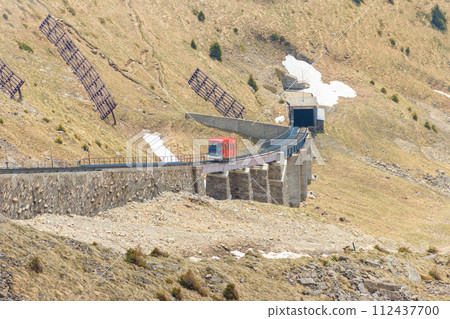 Red funicular to Niesen mountain in Switzerland Red funicular to Niesen mountain in Switzerland 112437700