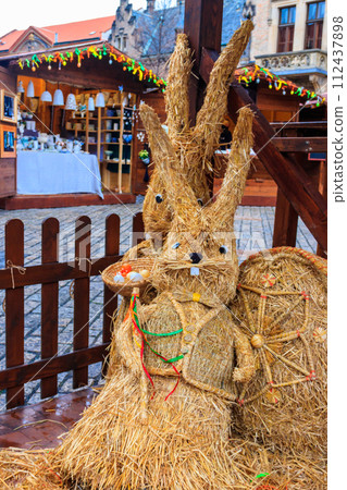 Easter decorative straw rabbit bunnies in Easter market in Prague, Czech Republic Easter decorative straw rabbit bunnies in Easter market in Prague, Czech Republic 112437898