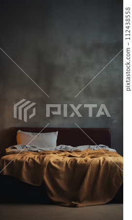 Tucked in twin bed isolated against a grunge wall backdrop Tucked in twin bed isolated against a grunge wall backdrop 112438558
