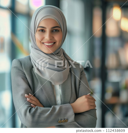 Portrait of Islamic woman businesswoman 25-35 years with office background 112438609