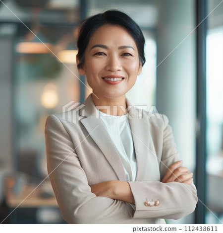 Portrait of a Chinese woman businesswoman 40-50 years old against the background of the office 112438611
