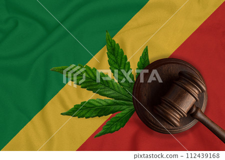 Cannabis leaf and judge gavel on the Congo flag background 112439168