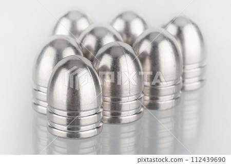 silver bullets for muzzle guns on white. silver bullets for muzzle guns on white. 112439690