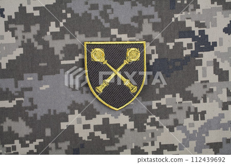 KYIV, UKRAINE - October 5, 2022. Russian invasion in Ukraine 2022. Ukraine Army Commander in Chief of the Armed Forces of Ukraine uniform shoulder sleeve insignia badge. KYIV, UKRAINE - October 5, 2022. Russian invasion in Ukraine 2022. Ukraine Army Commander in Chief of the Armed Forces of Ukraine uniform shoulder sleeve insignia badge. 112439692