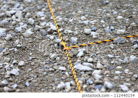 Image of parking lot with crushed stone 112440134