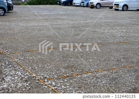 Image of parking lot with crushed stone Image of parking lot with crushed stone 112440135