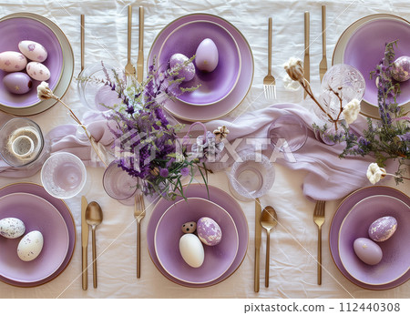 Happy Easter. Lavender Easter Table Setting 112440308