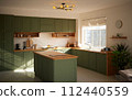 a sun-filled green kitchen 112440559