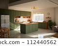 a sun-filled green kitchen 112440562