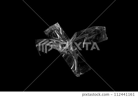 adhesive plastic tape isolated on black background adhesive plastic tape isolated on black background 112441161