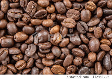 Fresh roasted brown coffee beans background Fresh roasted brown coffee beans background 112441226