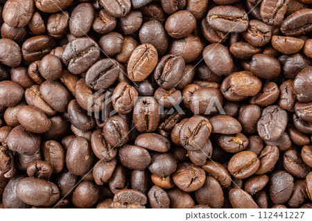 Fresh roasted brown coffee beans background Fresh roasted brown coffee beans background 112441227