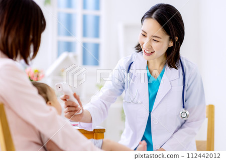 Pediatrics examination female doctor 112442012