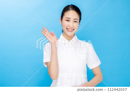 Young woman in a nurse color back 112442037