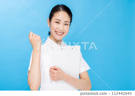 Young woman in a nurse color back 112442045