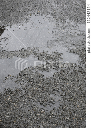 asphalt puddle 112442134