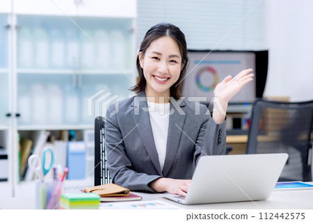 OL image of a woman in a suit 112442575