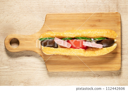 Fried sandwich with salad 112442606