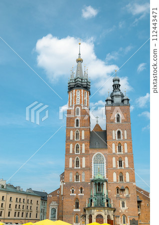 St. Mary's Basilica church at Rynek Glowny Main Market Square in Krakow, Poland St. Mary's Basilica church at Rynek Glowny Main Market Square in Krakow, Poland 112443471