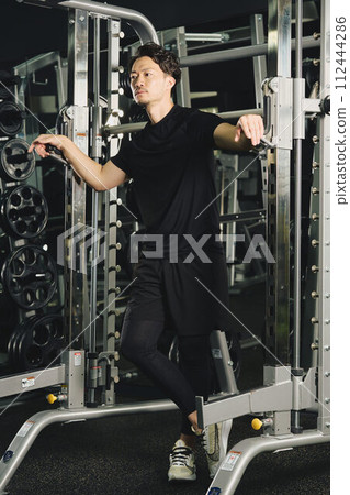 Portrait of a man wearing training clothes Portrait of a man wearing training clothes 112444286