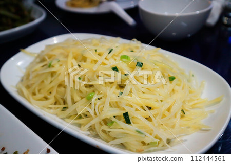 stir fried shredded potatoes ,stir fried potatoes or Chinese Stir Fried Shredded Potatoes or Tudou Si stir fried shredded potatoes ,stir fried potatoes or Chinese Stir Fried Shredded Potatoes or Tudou Si 112444561