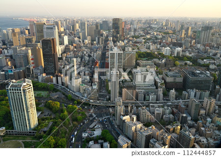 Spring The skyscrapers of the metropolis bathed in the setting sun seen from the Tokyo Tower Observation Deck Spring The skyscrapers of the metropolis bathed in the setting sun seen from the Tokyo Tower Observation Deck 112444857