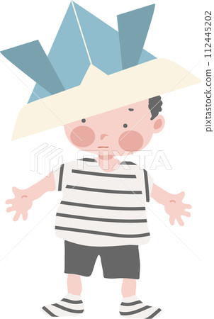 A boy playing with a helmet made from origami 112445202