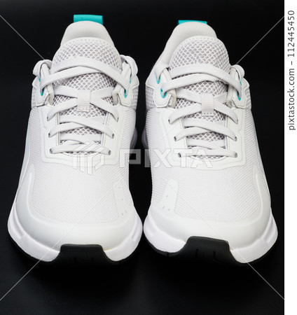 Clean new white pair of shoes 112445450