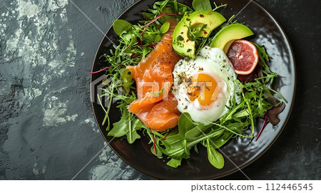 Poached egg and salmon on an avocado salad. AI Generated. 112446545